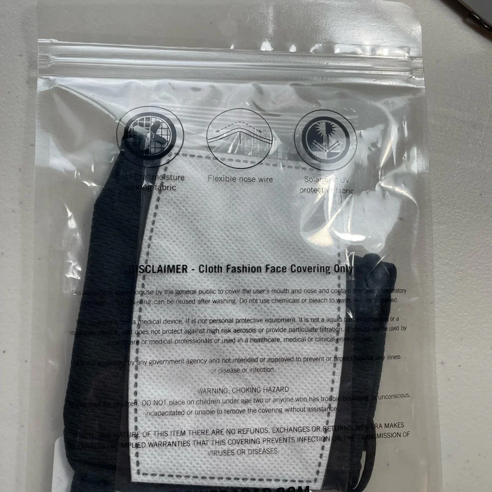 2 San Francisco 49er official NFL face masks 1 sealed and unopened, 1 opened
